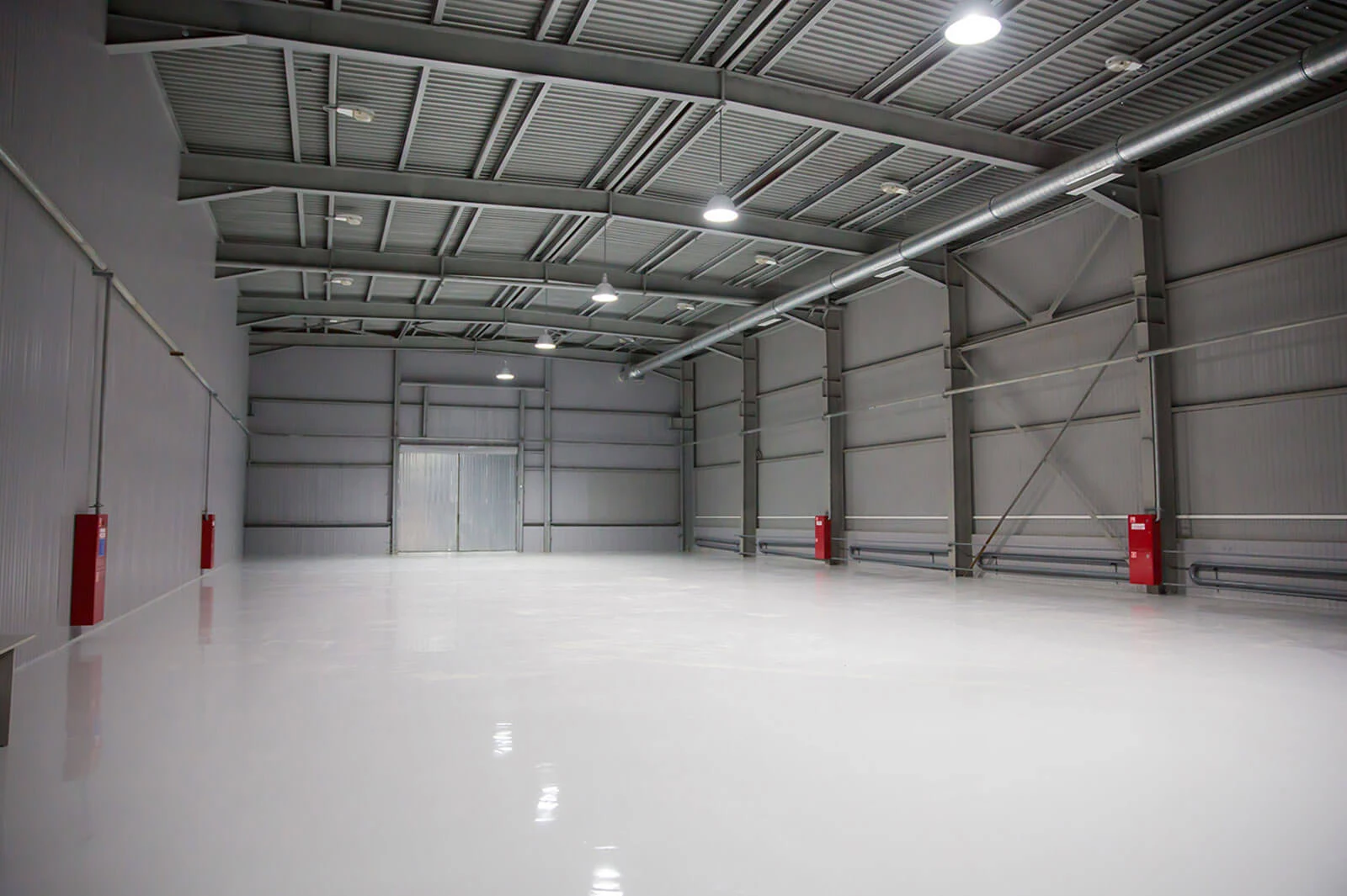 Industrial steel building interior and roof structure