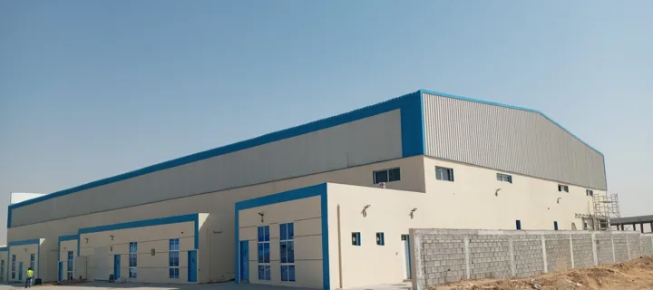 Industrial building exterior at a Roofings Middle East project