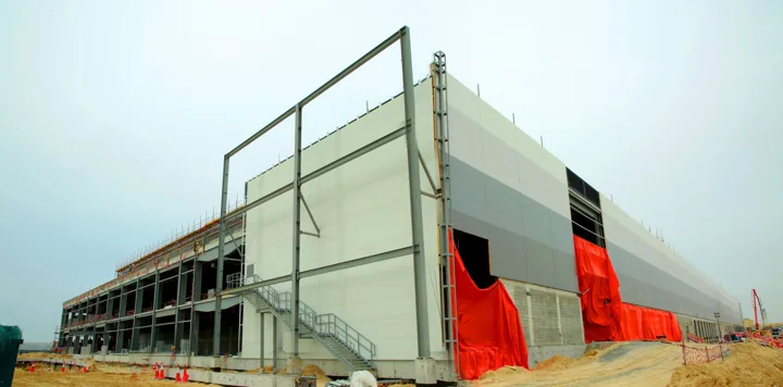 Wall cladding installation at a Roofings Middle East project